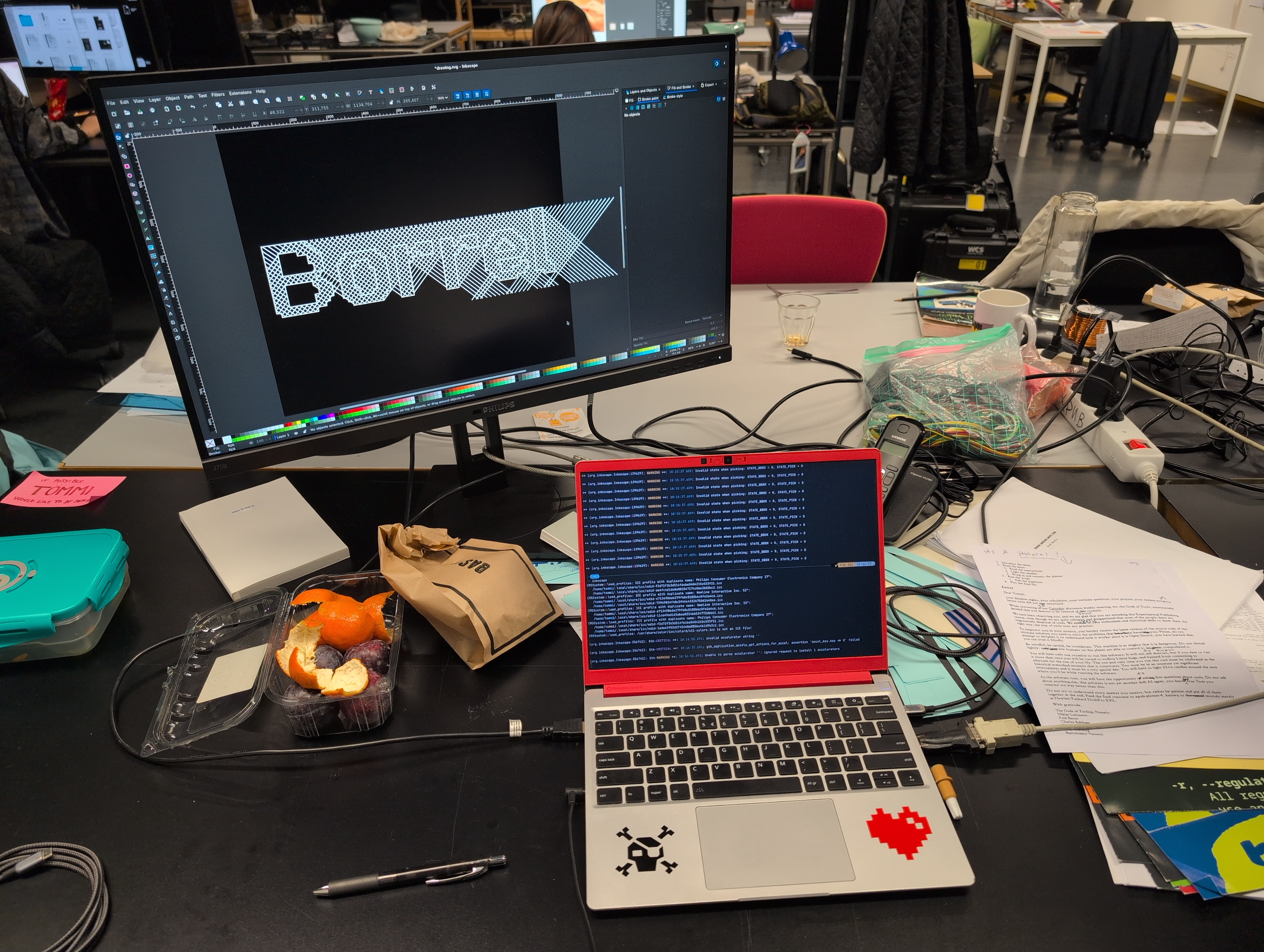 Photo of Tommi’s desk while preparing the SVG file with the text “Borrel” to export in HP-GL via Inkscape.