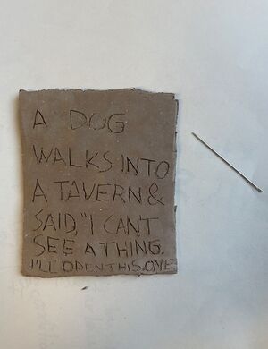 t clay tablet engraved with writing