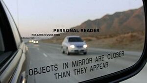a picture of the rearview mirror of a car